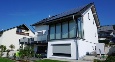 Einfamilienhaus in Holzbauweise mit Balkon