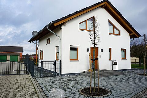 Einfamilienholzhaus mit Putzfassade