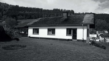 Vorherfoto: Einfamilienhaus vor Aufstockung