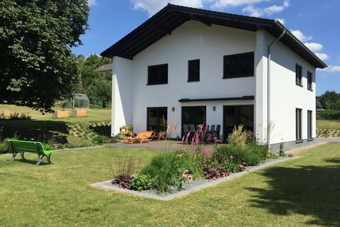 Neubau Holzhaus mit Putzfassade