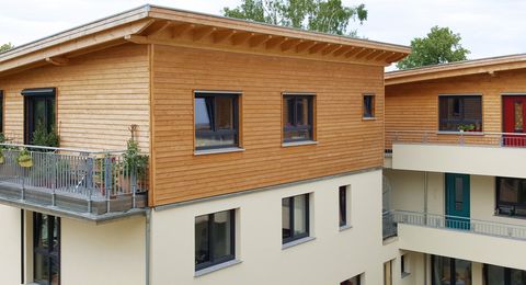 Staffelgeschosse mit Holzfassade für PatchWorkHaus in Aachen