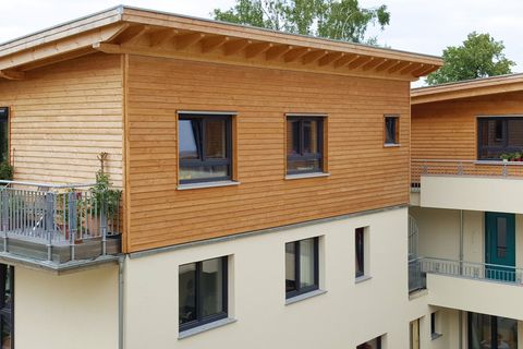 Staffelgeschosse mit Holzfassade für PatchWorkHaus in Aachen