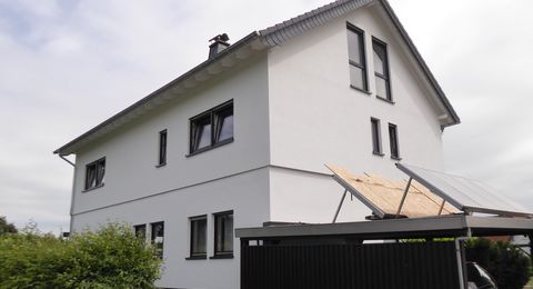 aufgestocktes Zweifamilienwohnhaus